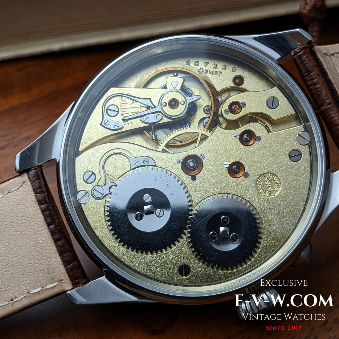 Restored IWC vintage movement in a luxury marriage watch case by EVW