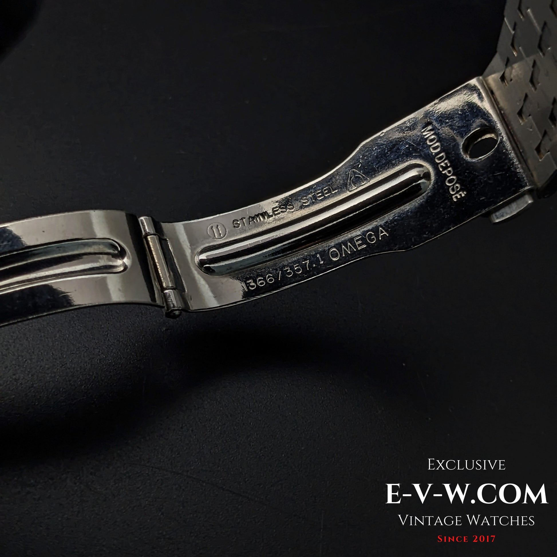 Close-up of Omega Equinoxe Reverso clasp showing stainless steel markings and model reference 1366/7357, emphasizing vintage authenticity.