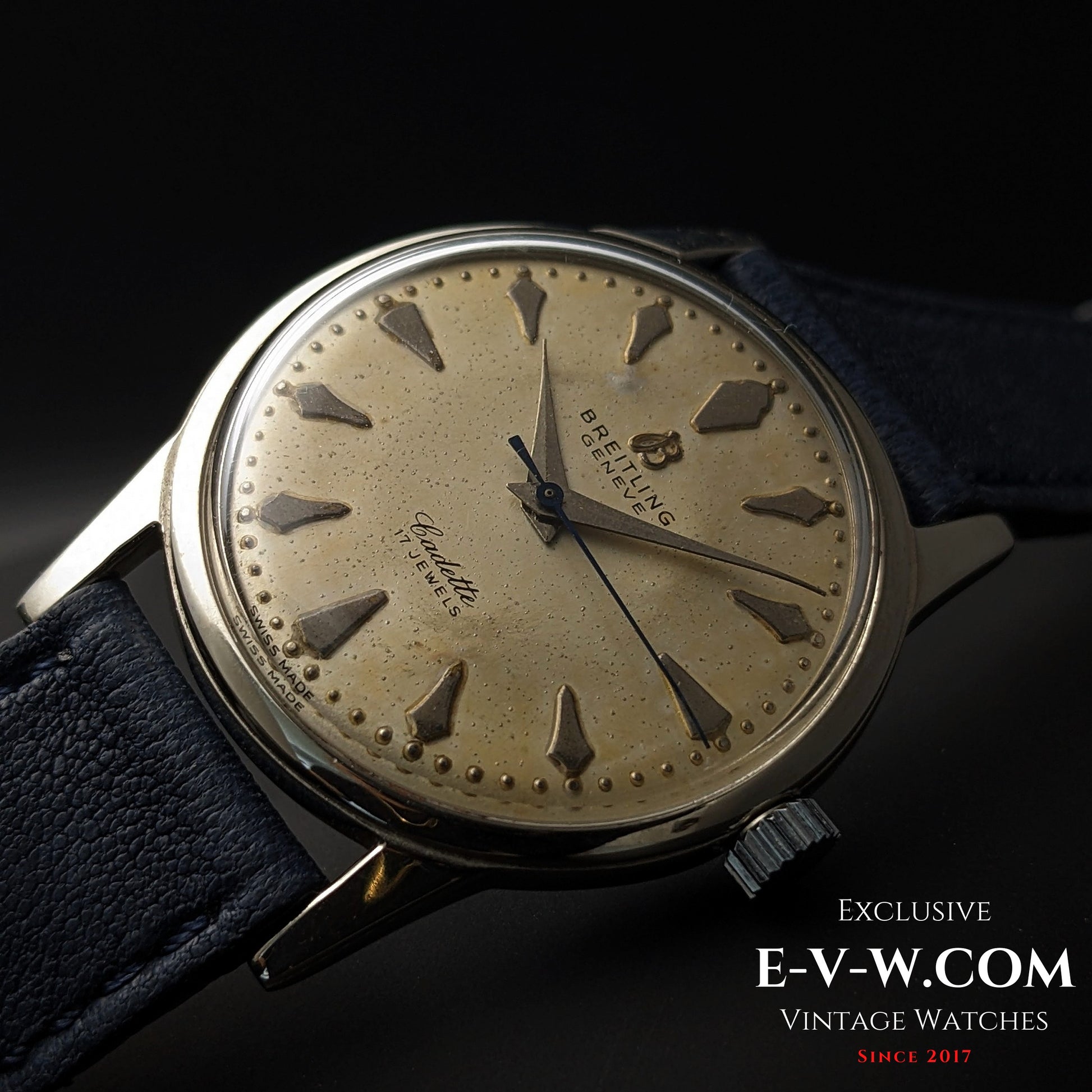 Angled view of Vintage Breitling Geneve Cadette Watch 1960s with domed crystal and aged cream dial, ideal for vintage watch enthusiasts.