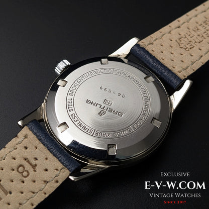 Rear view of Vintage Breitling Geneve Cadette Watch 1960s showing stainless steel back with engraved model number and leather strap.