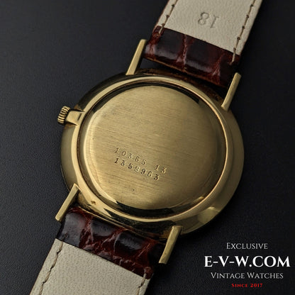 Back view of DOXA Vintage 14k Gold Watch 1950 showing engraved reference number 10365 13 and serial number on polished gold case.