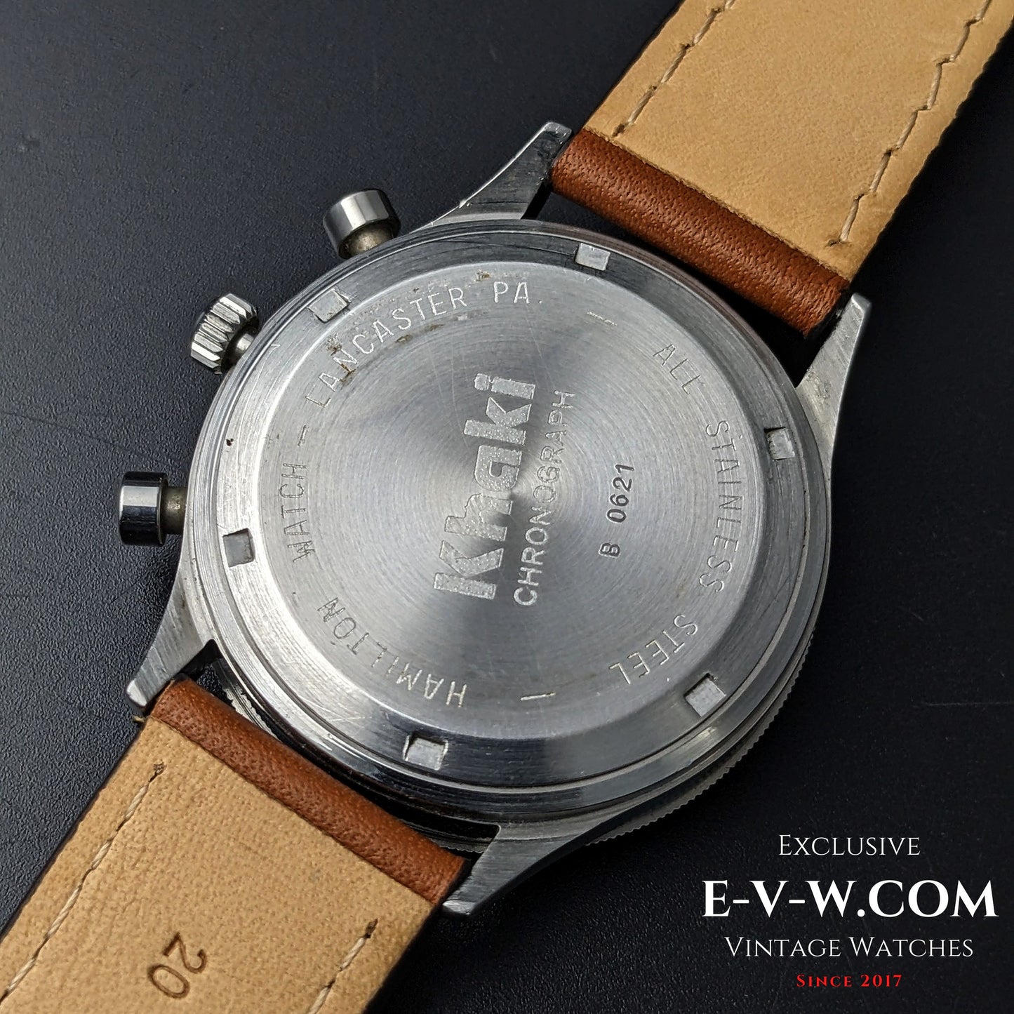 Back case of Hamilton Lancaster Chronograph engraved with Kraki branding and Lancaster PA, highlighting its vintage authenticity.