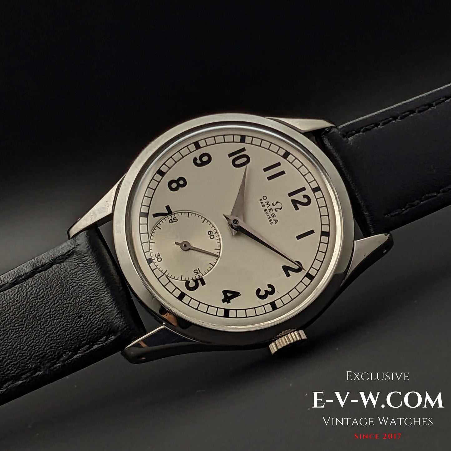 Side view of the Omega FAB SUISSE Ref. 2750-6 vintage wristwatch, showcasing its polished stainless steel case and elegant design.