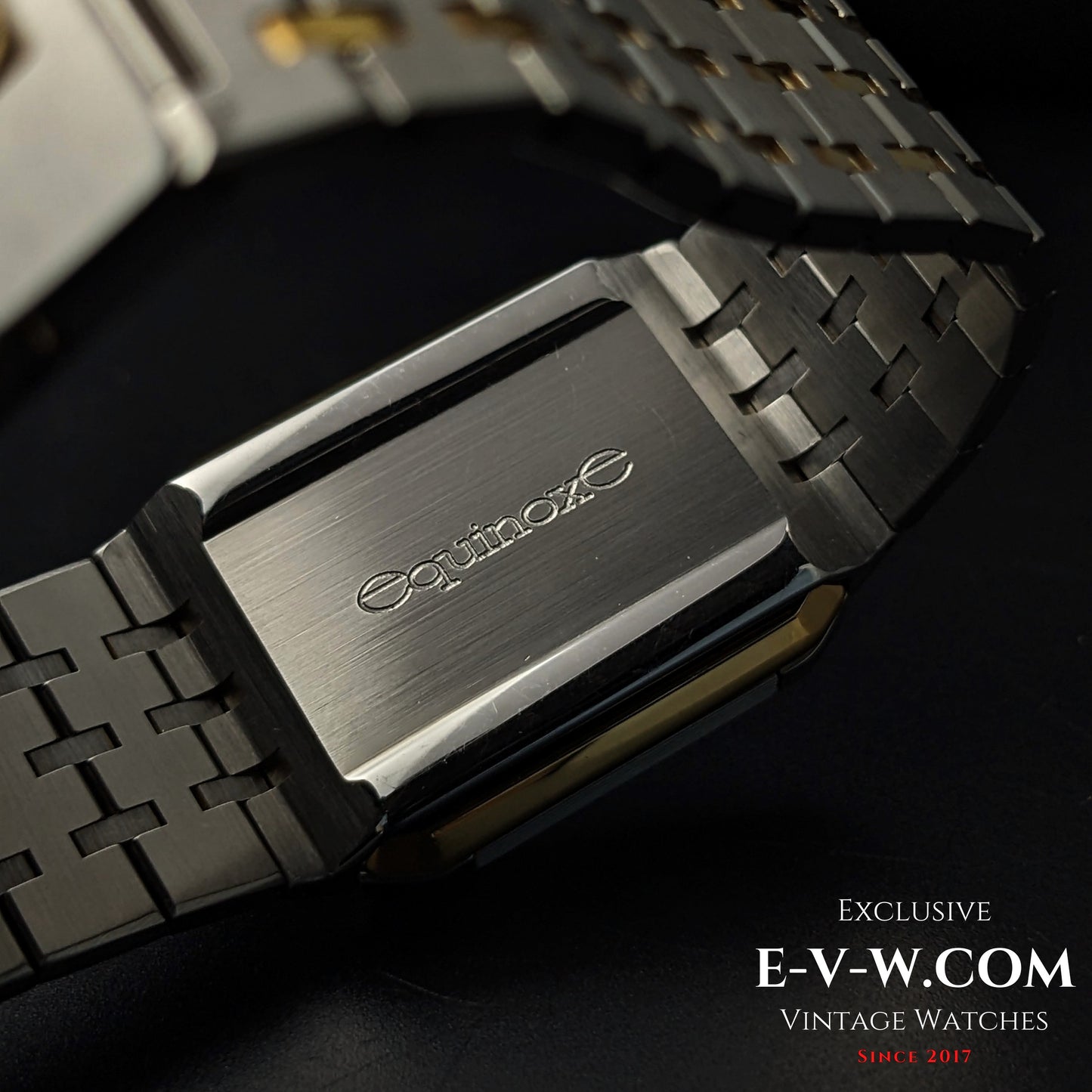 Close-up of Omega Equinoxe Reverso clasp engraved with 'Equinoxe', emphasizing the watch's unique reversible design and vintage branding.
