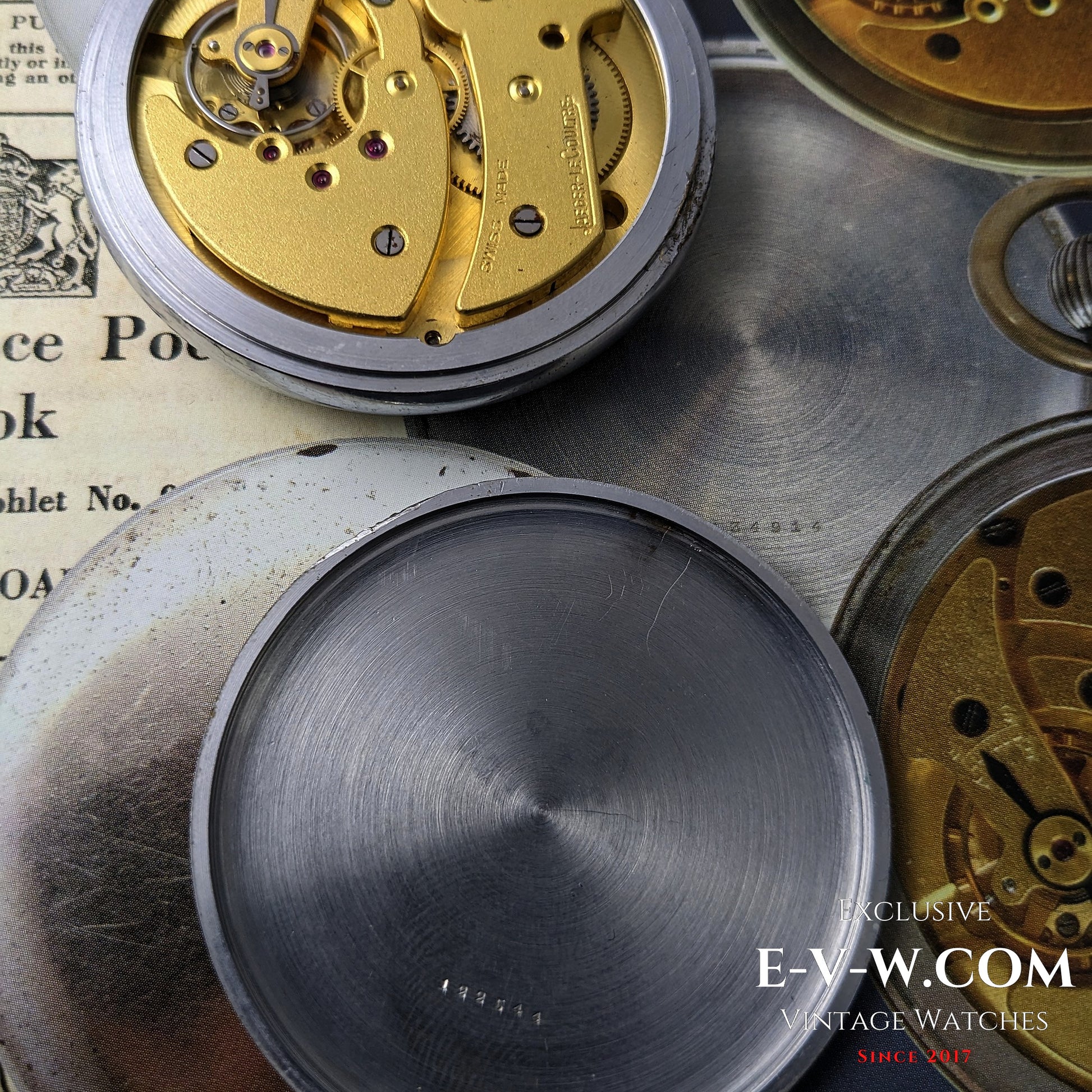 Open caseback of Jaeger-LeCoultre WWII Military Watch Cal. 467 Vintage 1940 revealing inner case and movement details.
