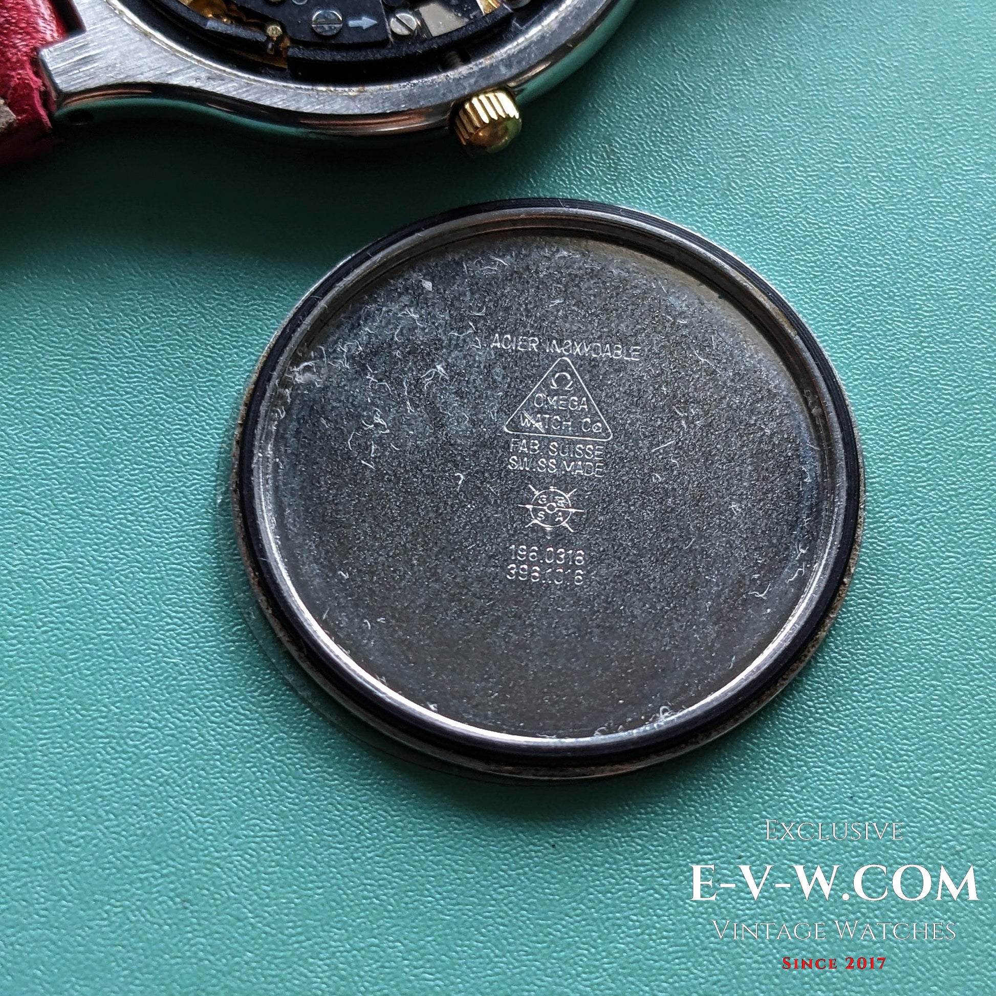 Inside case back of Omega vintage watch Ref. 3961016, marked with Swiss-made and Omega Watch Co. engravings, confirming authenticity.