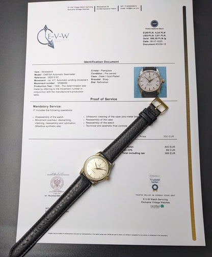 1958 Omega Seamaster Ref. 2828-9SC Cal. 471 vintage watch with service certificate and black leather strap laid on official documentation.